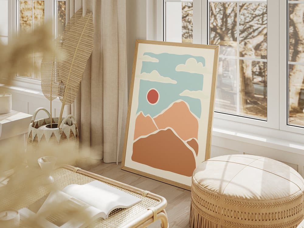 Mountain print leaning by a window